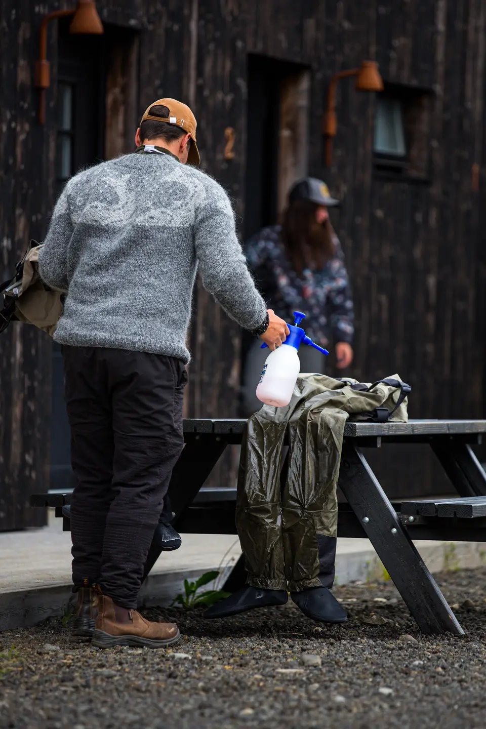 Waders being disinfected outside the lodge